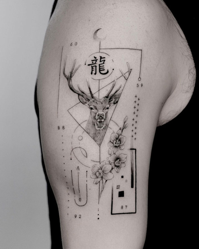 Geometric composition with deer and flowers tattoo
