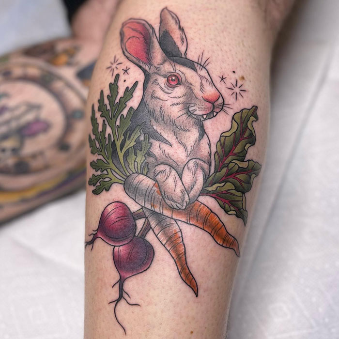 Bunny with vegetables tattoo on leg