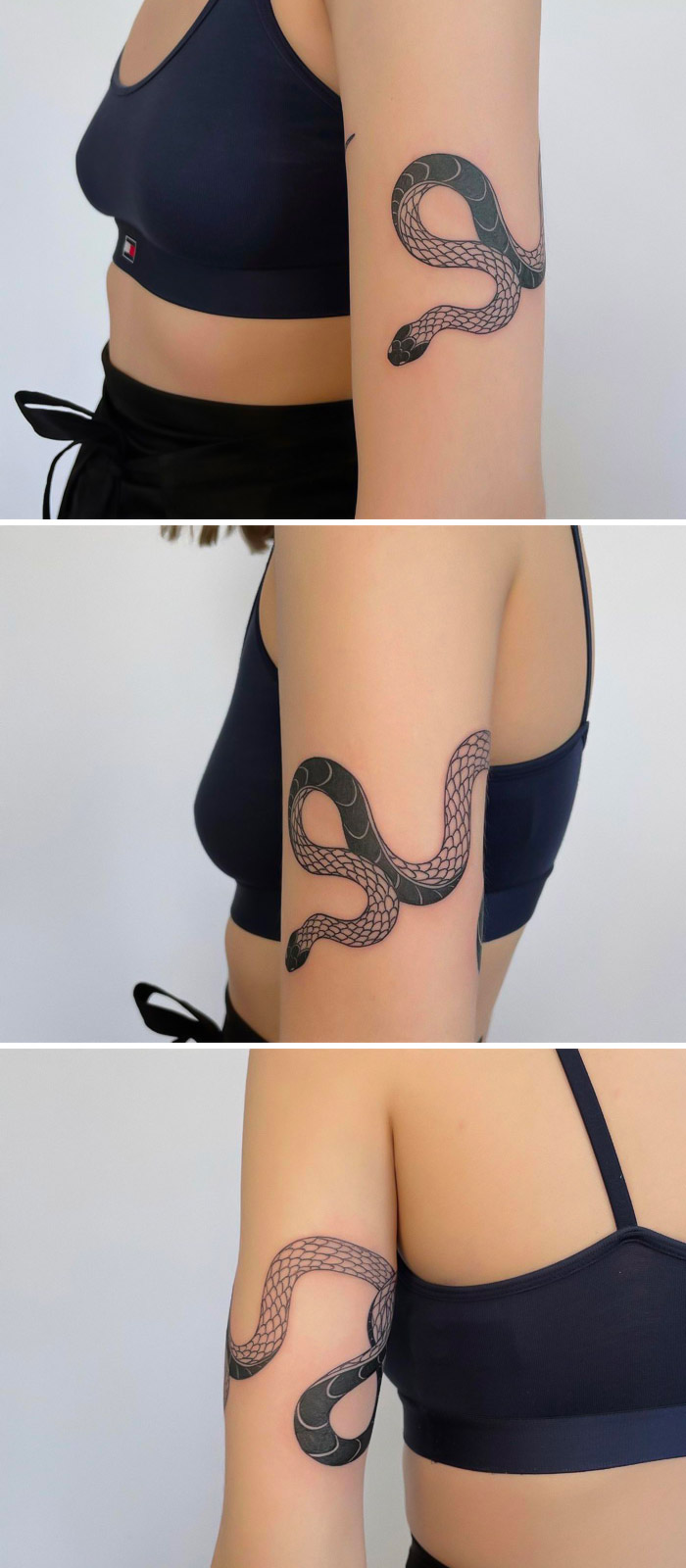 Snake tattoo in black ink on a woman's arm, showcasing detailed scales and elegant curves.