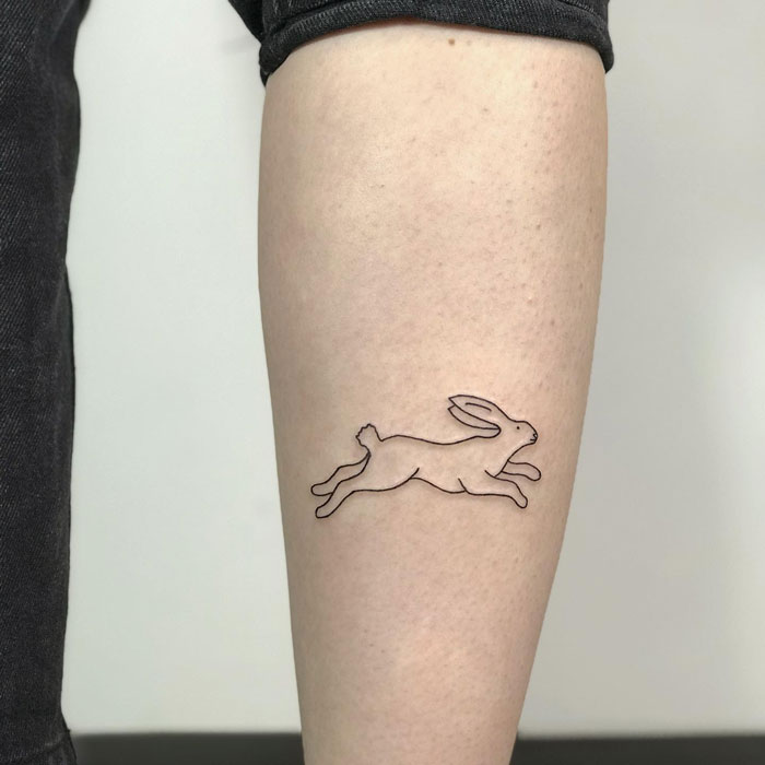 Running rabbit calf tattoo