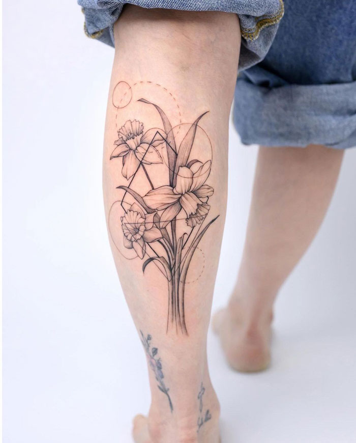 Flower calf tattoo