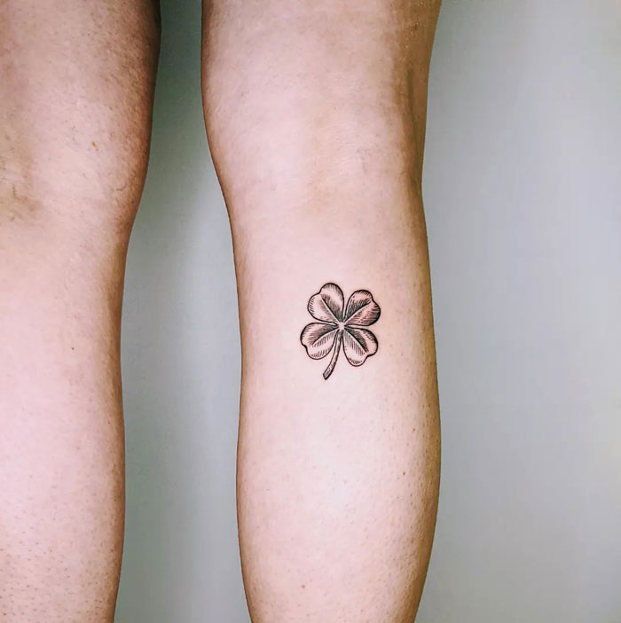 Minmalistic clover calf tattoo