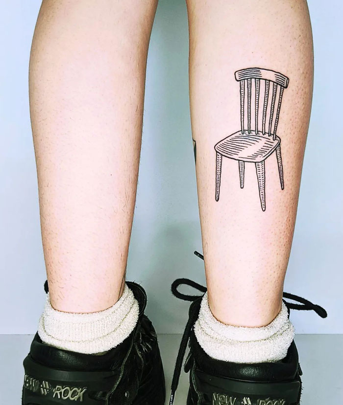 Minimlaistic chair calf tattoo