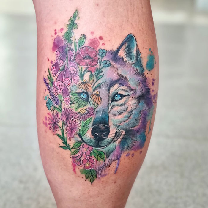 Watercolor floral wolf calf tattoo