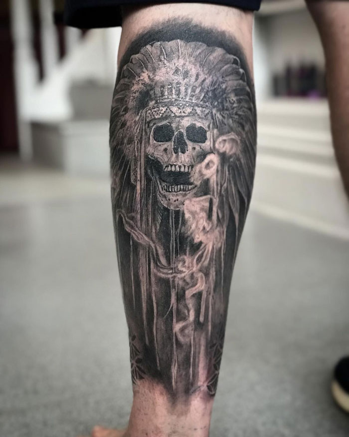 Skeleton calf tattoo