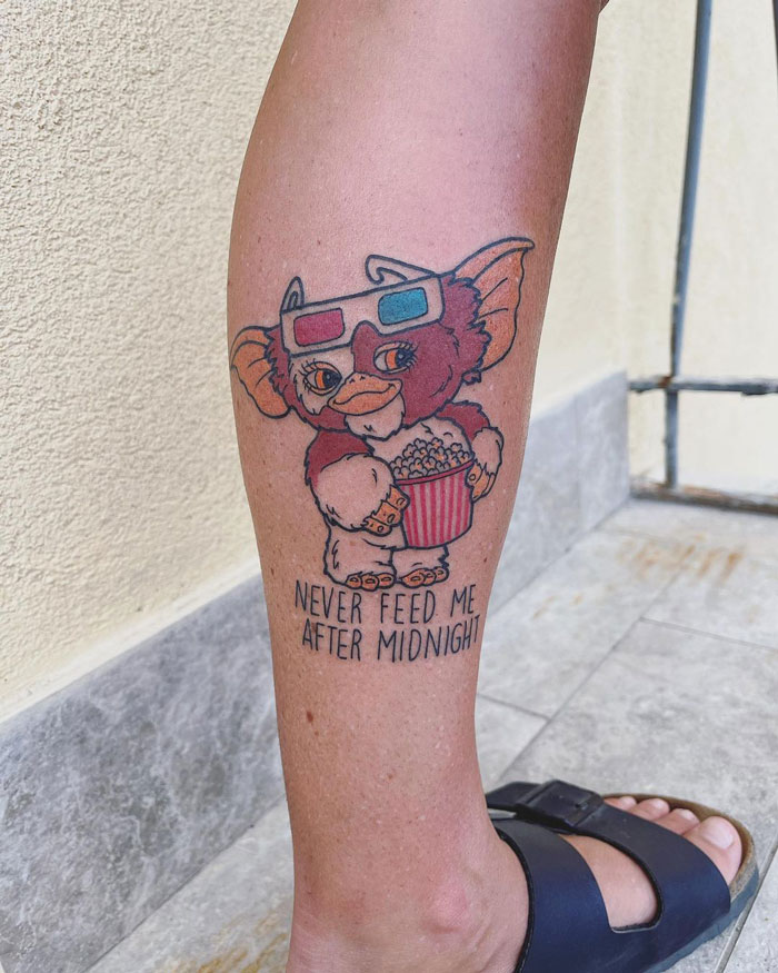 Watercolor gizmo calf tattoo