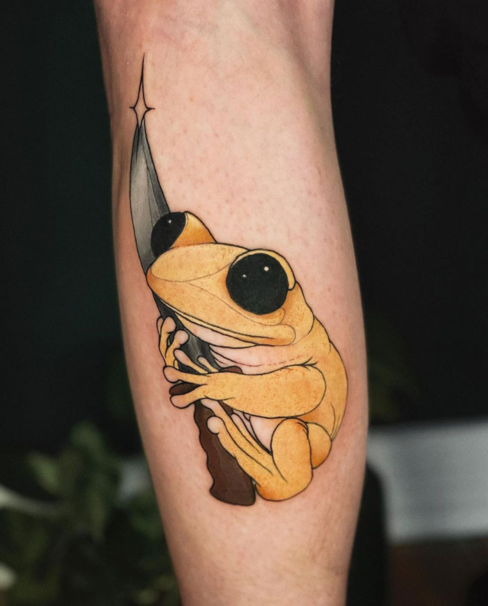Yellow frog calf tattoo