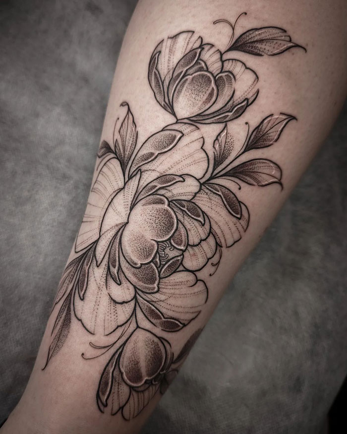 Flower calf tattoo