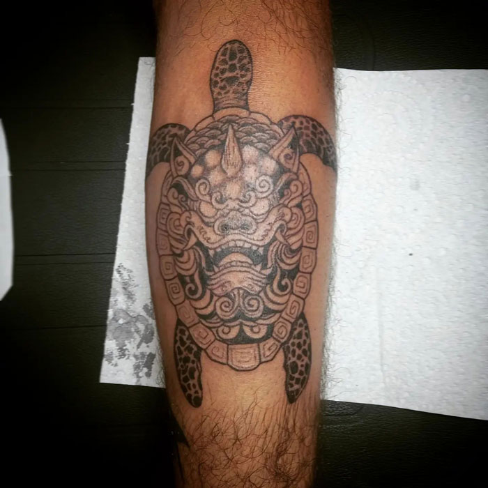 Fu Dog turtle calf tattoo