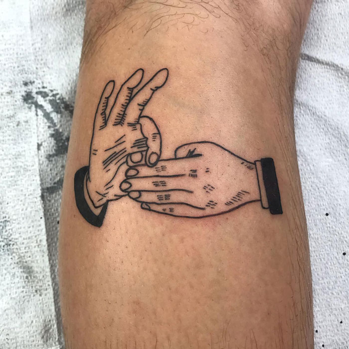 Magic with fingers calf tattoo