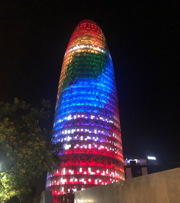 A Colorful, Bullet-Shaped Building In Barcelona