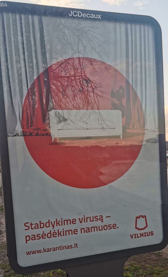 This Ad Looks Like A Stop Sign. Translates To: Let's Stop The Virus By Staying At Home