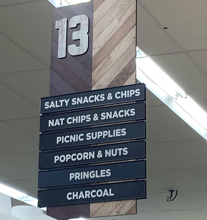 The Grocery Store I Go To Lists Pringles As Meaningfully Distinct From Salty Snacks And Chips In Their Aisle Signs