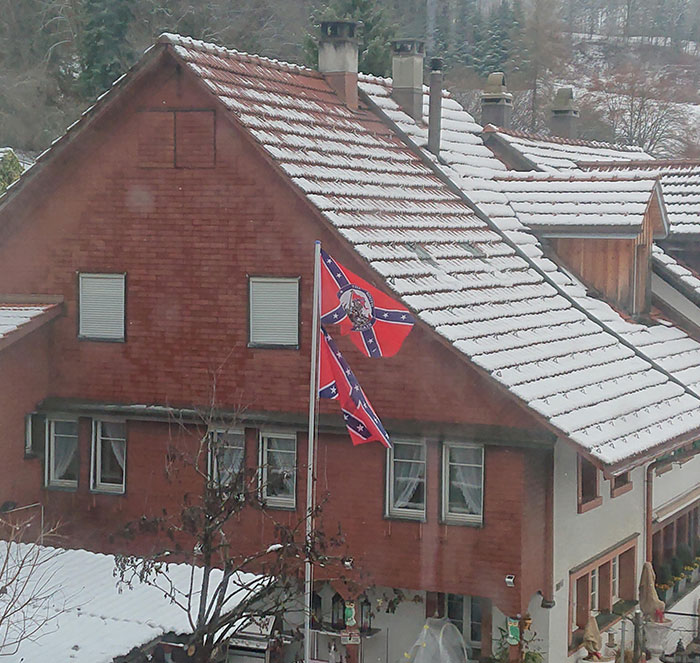 My New Neighbor's Flags. I Live In Switzerland