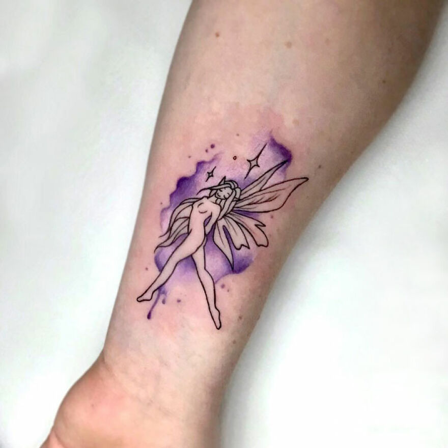 purple fairy tattoo on the forearm