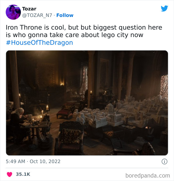 Scene from House of the Dragon showing a room with a model city and a person at a desk.