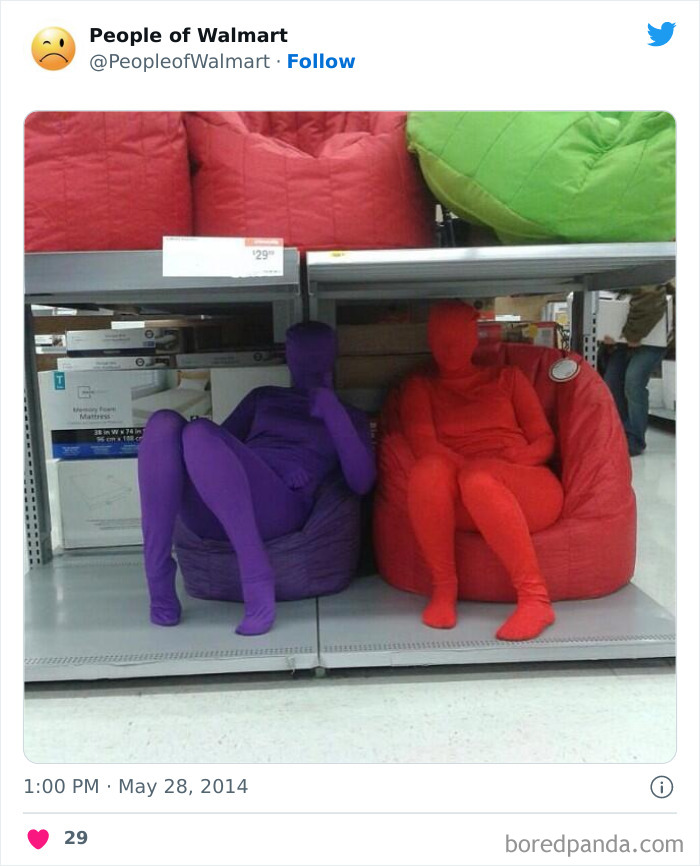 Persons sitting and wearing same colors as beanbags