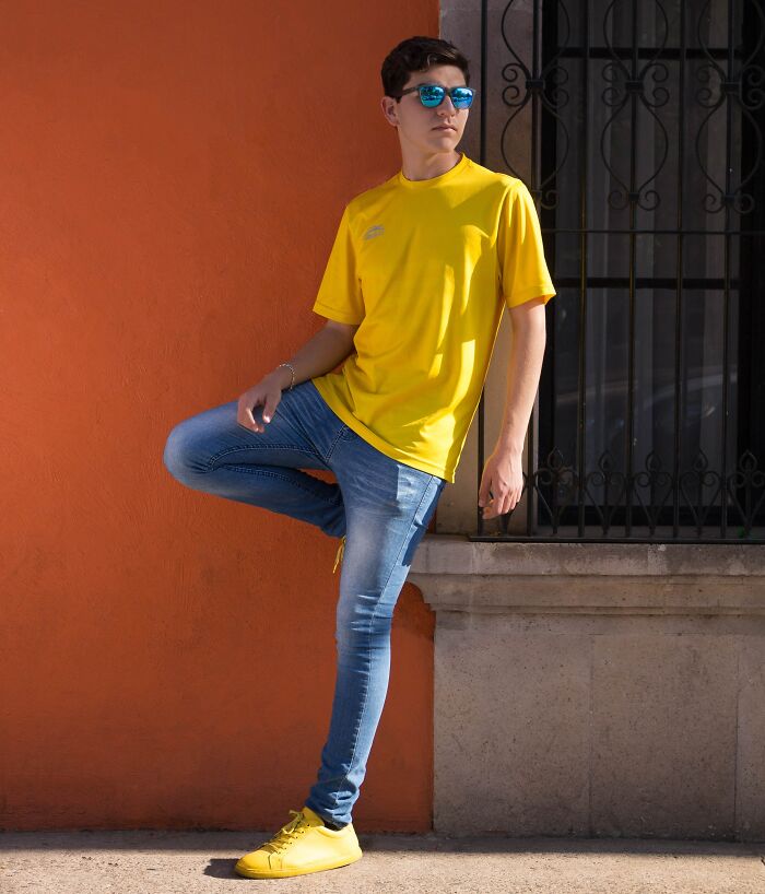 Man Posing In Front Of The House 