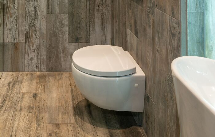 White Toilet In A Clean Bathroom 