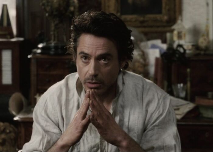 In Sherlock Holmes (2009), Robert Downey Jr's Shirt Is Wrinkly. This Is Because He Forgot To Iron, Man
