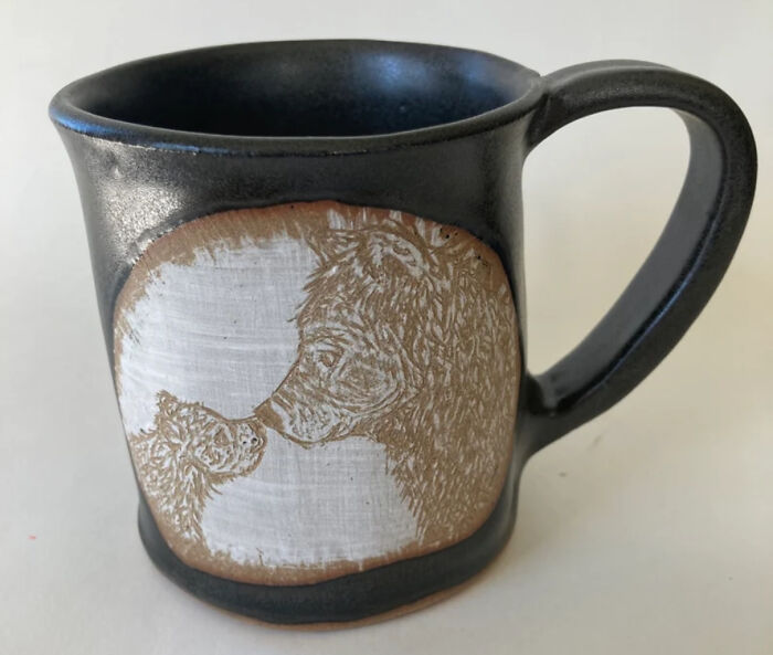 The Tender Bond Between A Mother Bear And Its Cub