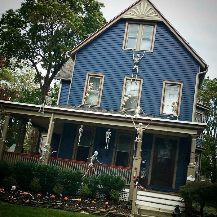 Another Great Halloween House. Love The Skeleton Hanging From The Top Window