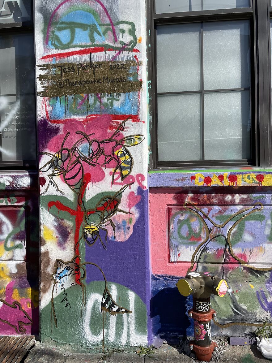 Standpipe With Colorful Graffiti And "Killer" Bees