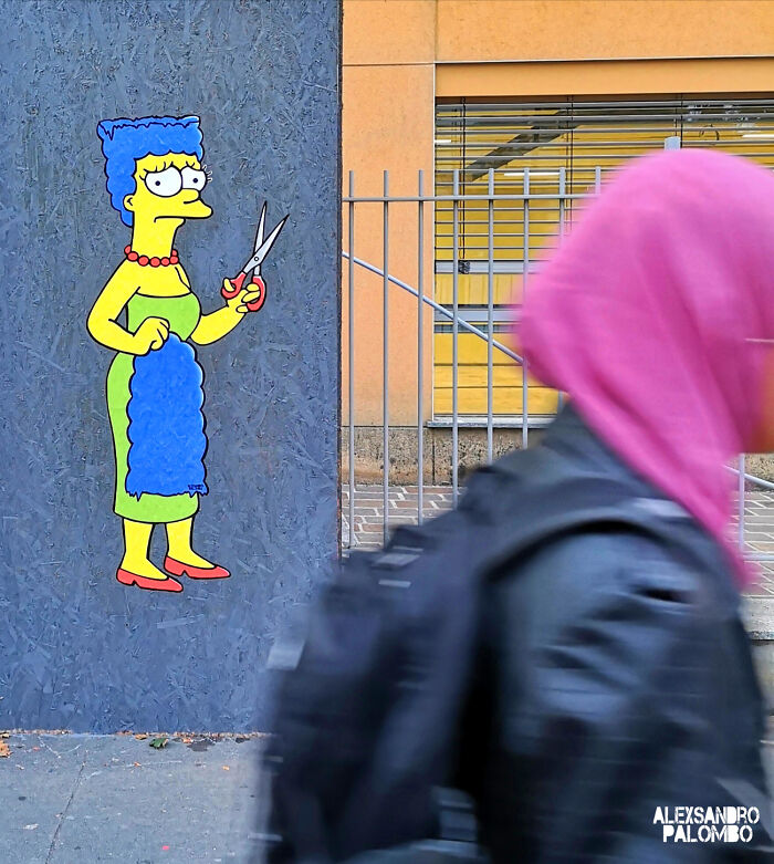 Street Art By Alexsandro Palombo "The Cut" Portrays Marge Simpson Cutting Her Iconic Hair In Solidarity With Mahsa Amini