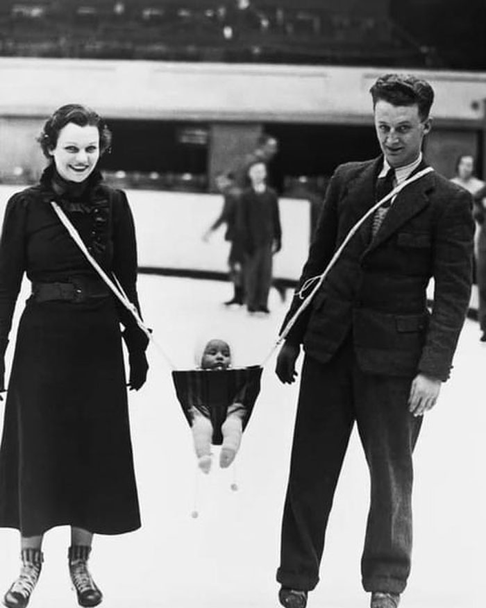 Jack Milford, Player With The Wembley Monarchs Ice Hockey Team, Invented A Carrying Device So That His Baby Can Join His Wife And Himself On The Ice, 1937. (Photo By L. C. Buckley)