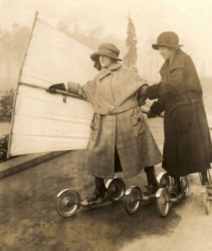 Two Young Ladies Inline Skating With A Sail In Berlin, 1923