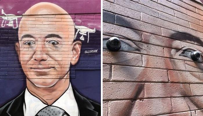 A Jeff Bezos Mural With Surveillance Cameras For Eyes
