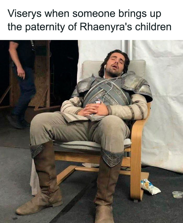 Actor in medieval armor sitting on a chair, captioned with a humorous "House of the Dragon" meme.
