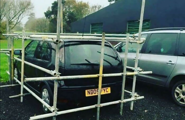 My Mate Told The Driver Of The Black Corsa Not To Park In The Company's Parking Space. He Gave My Mate Attitude And Ignorance. So My Mate Put Scaffold Up Around His Car