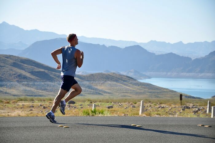 Man Running On The Road With A Stunning View