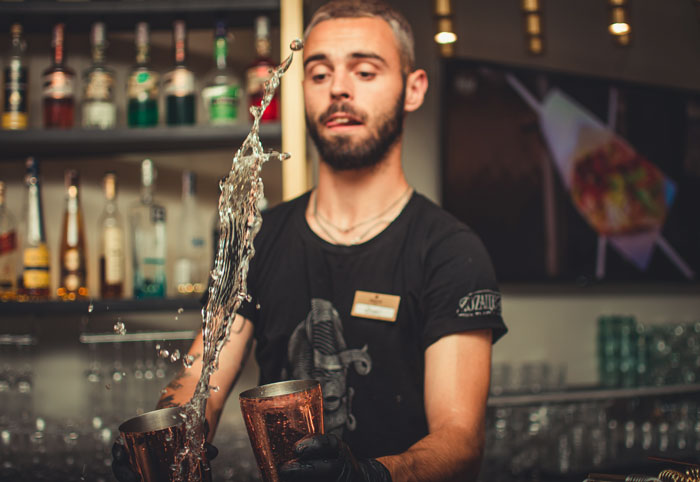 Picture of bartender making a coctail