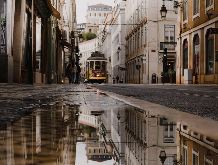 City with small train after rain