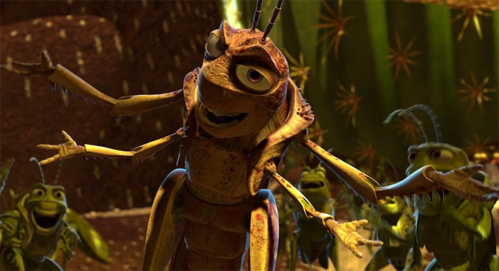 Hopper looking and smiling from A Bug’s Life