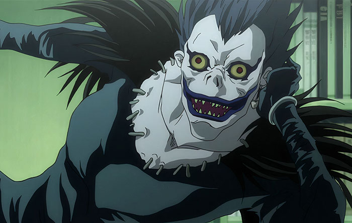 Ryuk lying and looking from Death Note