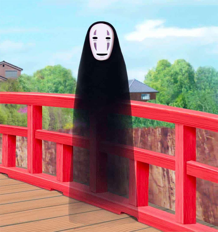 No Face standing and looking from Spirited Away