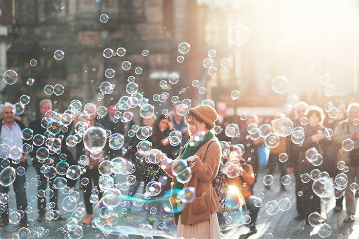 Picture of woman near many bubbles