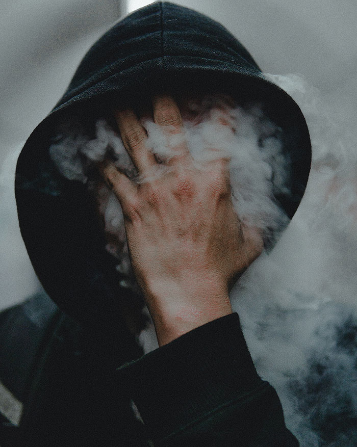 Picture of person with smoke in his head