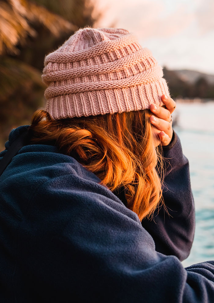 Woman hiding her eyes