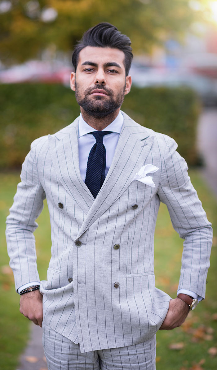 Man wearing suit and looking