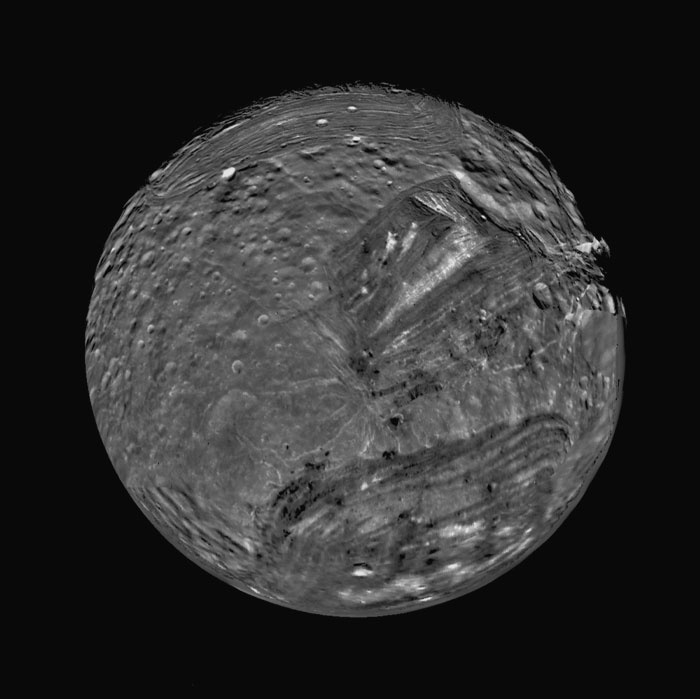 Uranus' Moon Miranda Has The Weirdest Surface Features Seen On A Moon