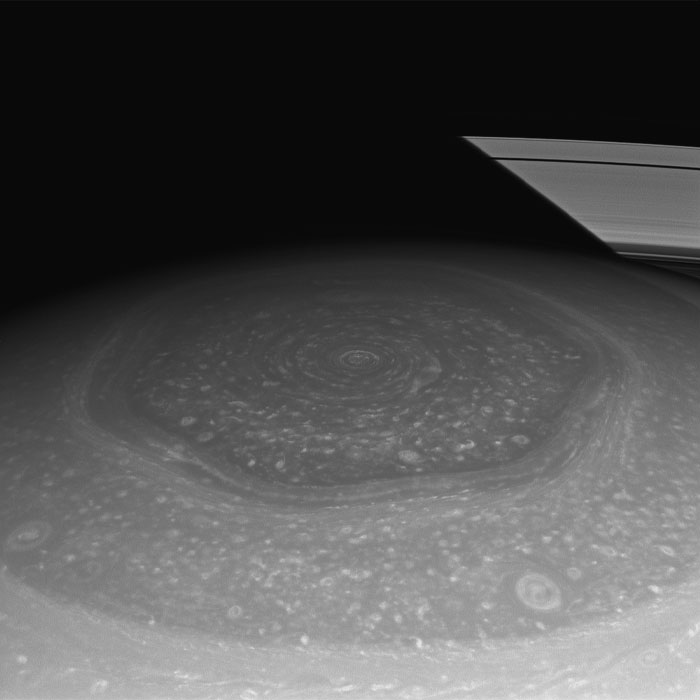 There Is A Six-Sided Jet Stream Of Winds Surrounding A Huge Storm And Making Up A Hexagon Shape At Saturn's North Pole