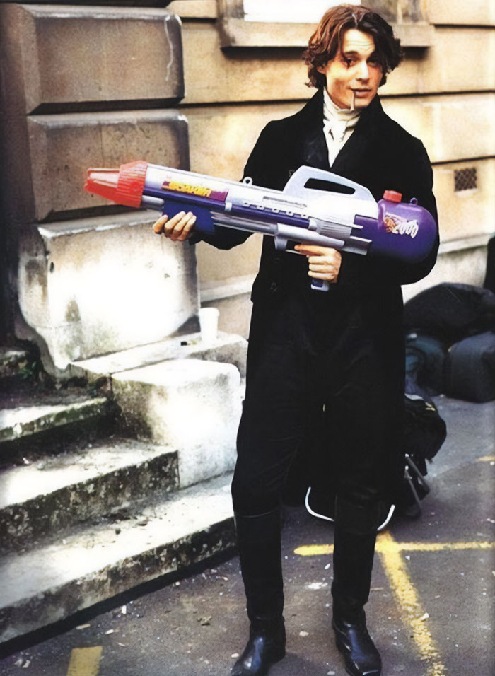 Johnny Depp Holding A Super-Soaker On The Set Of "Sleepy Hollow"