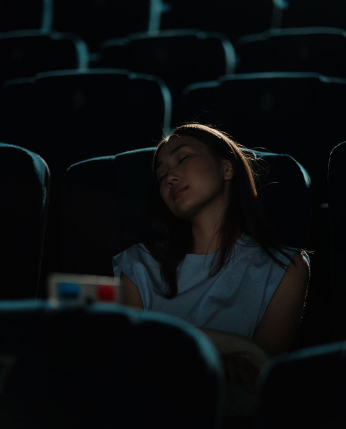 Woman felt asleep in the movie theatre 