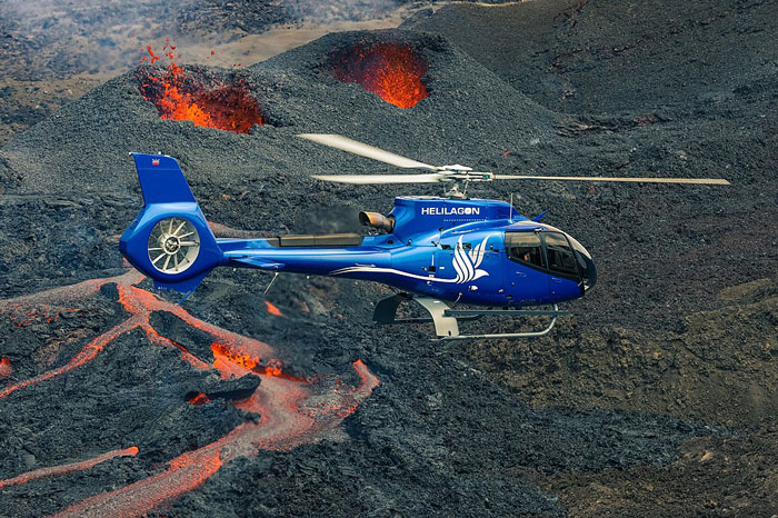 Helicopter Over A Volcano In Hawaii