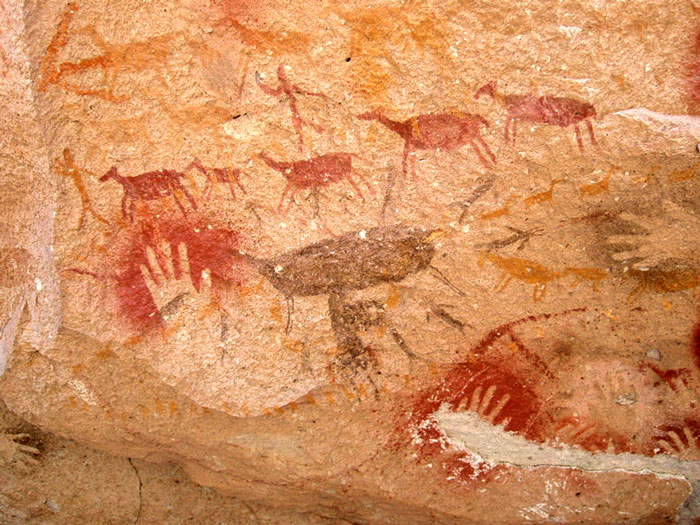 Photograph of hunting scene drawings at the Cuevas de las Manos in Santa Cruz Province, Argentina
