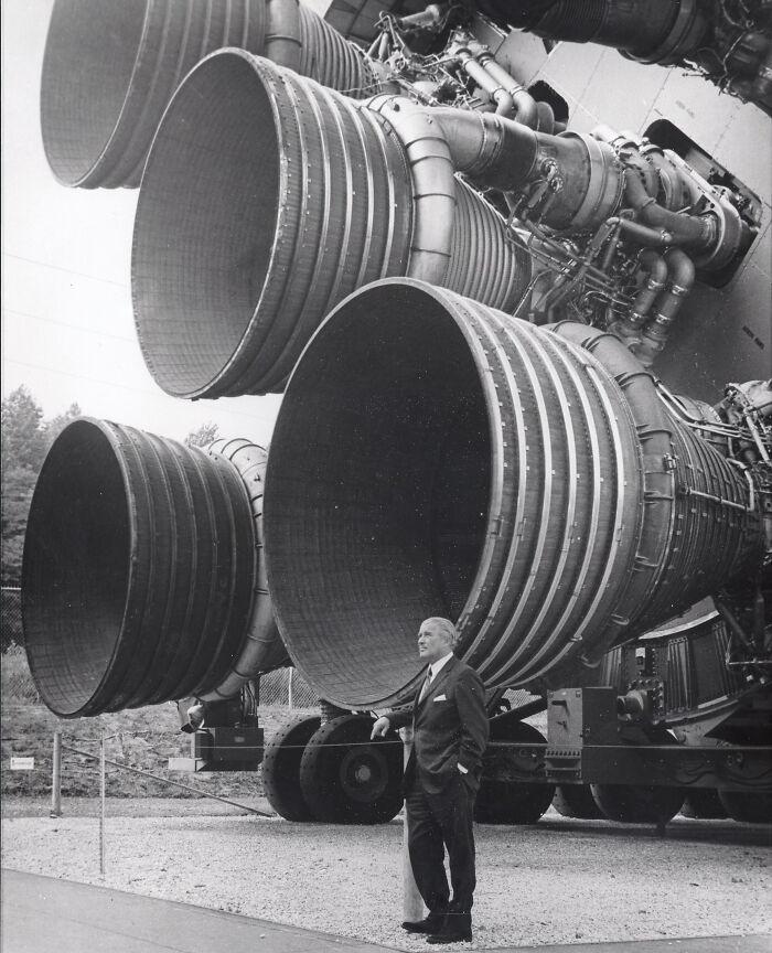 Warner Von Braun Next To The Engines Of The Saturn V Rocket Used For The Apollo Lunar Missions
